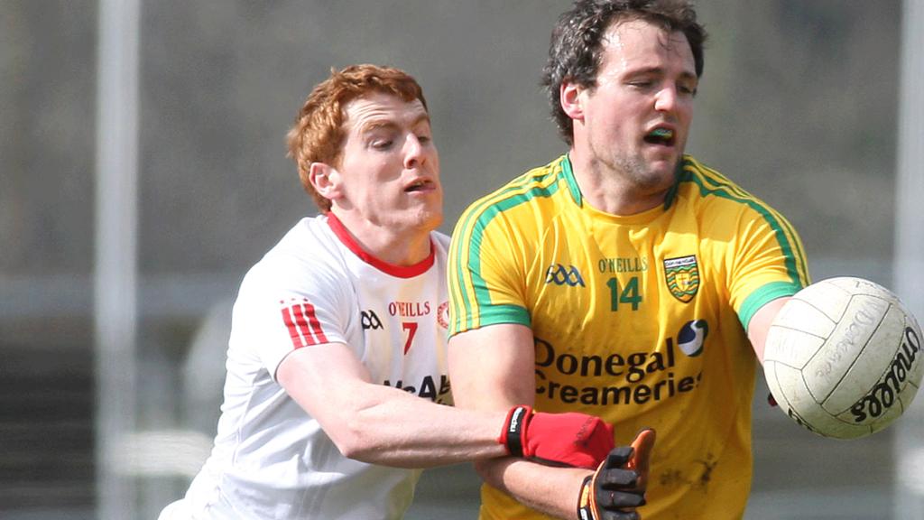 Tyrone's Peter Harte in action against Michael Murphy of Donegal