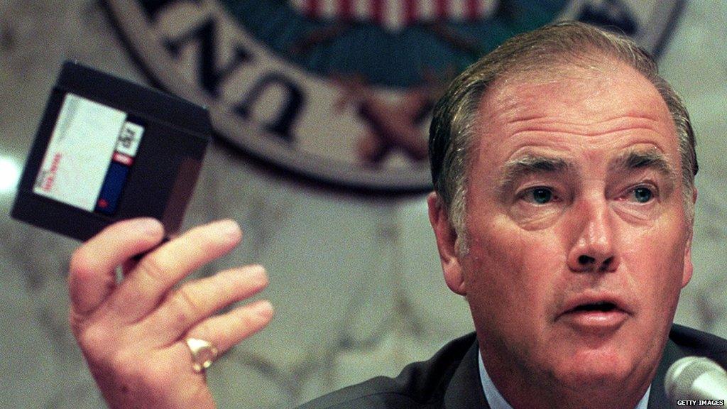 US Senator Frank Murkowski,R-AK, chairman of the Senate Energy and Natural Resources Committee, holds up a computer 'Zip' disk to demonstrate how easily secret information can be stolen during hearings 12 May, 1999 on Capitol Hill in Washington, DC. The committee is investigating damage done to US national security from Chinese espionage at Department of Energy nuclear weapons laboratories