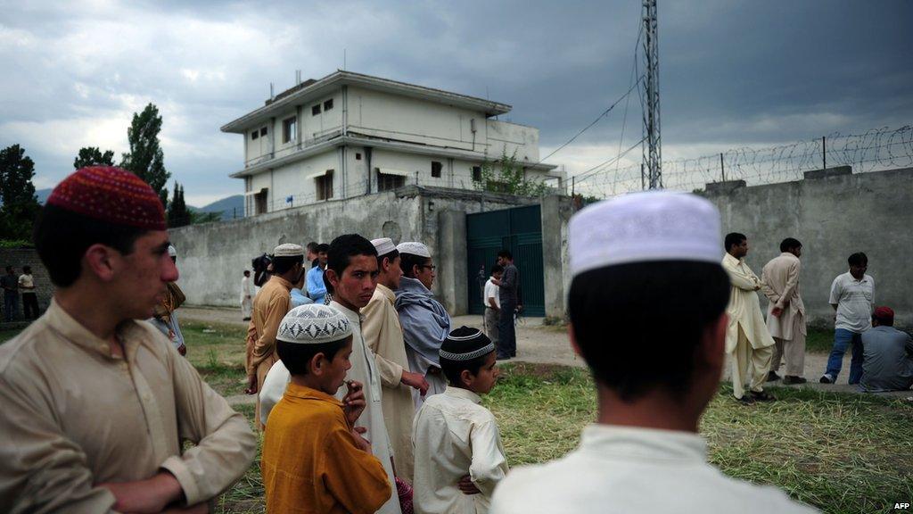 People gathering outside of the safe house