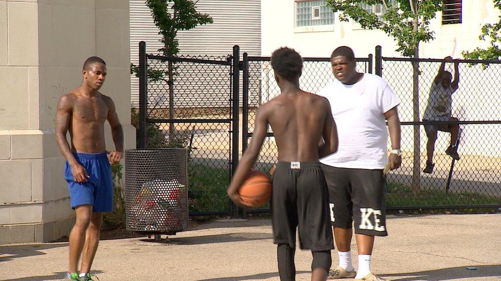 men playing basketball