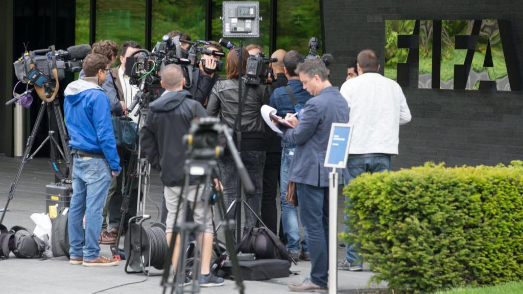 TV stations work after a press conference at the FIFA headquarters on May 27