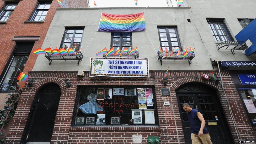 Banners and gay pride flags mark the 40th anniversary of the Stonewall riots at the Stonewall Inn on Christopher Street June 23, 2009