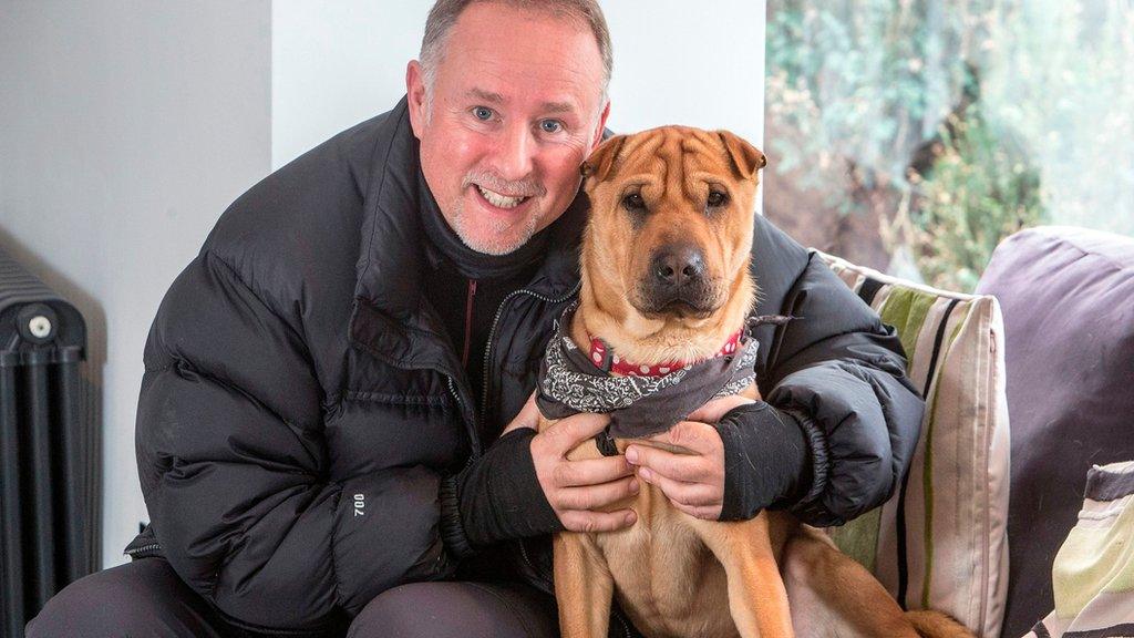 Ian Russell with the dog his rescued dog, Kai