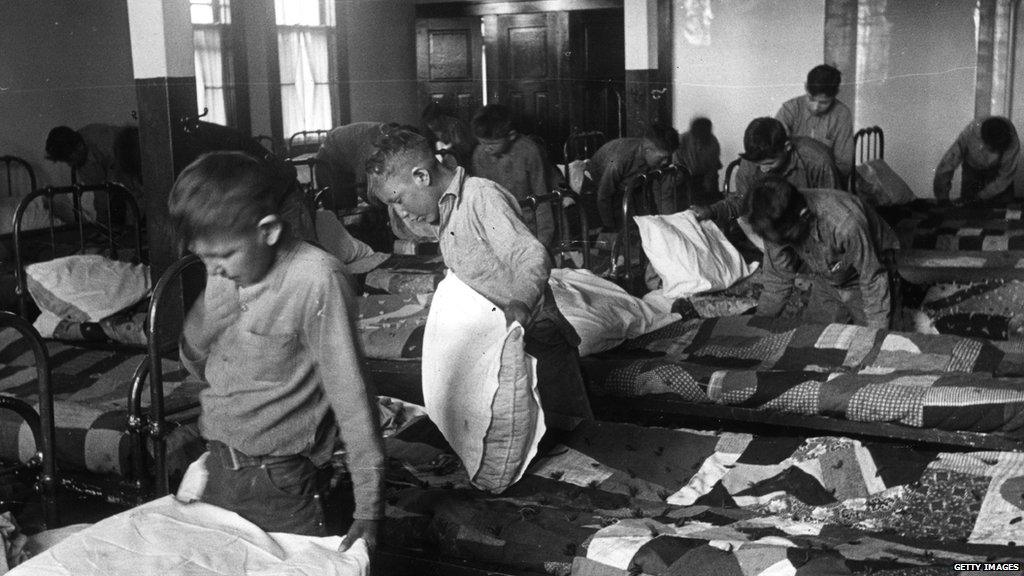 1950: North American Indian children in their dormitory at a Canadian boarding school. (Photo by Hulton Archive/Getty Images)