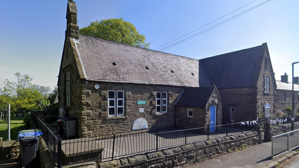 A stone school building