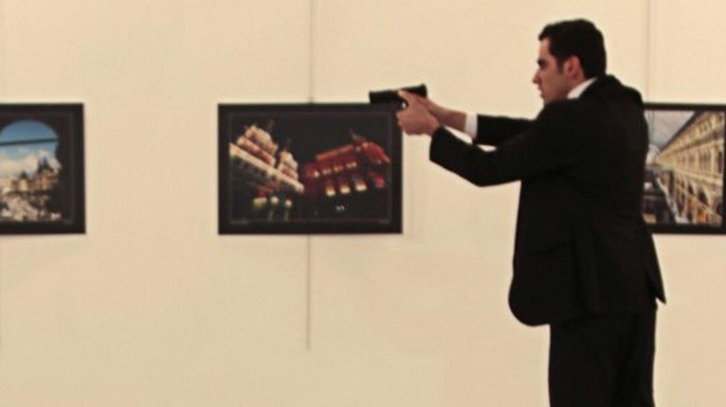 Mevlut Mert Aydintas points his gun