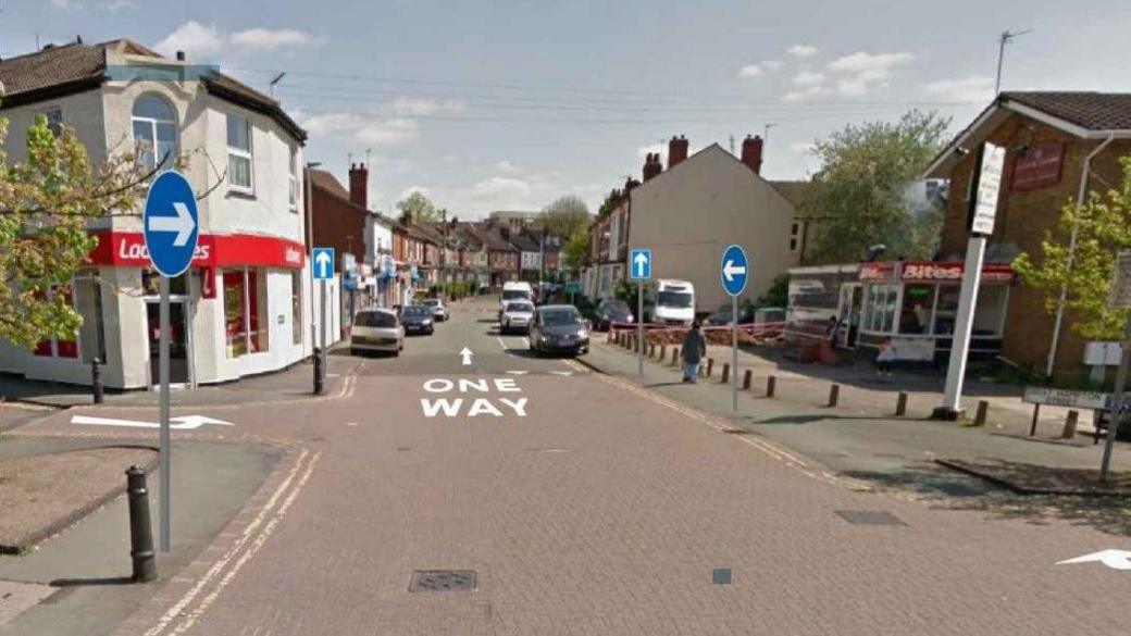 Council illustration showing one-way signs and road markings overlaid on a photo of Staveley Road, Wolverhampton.