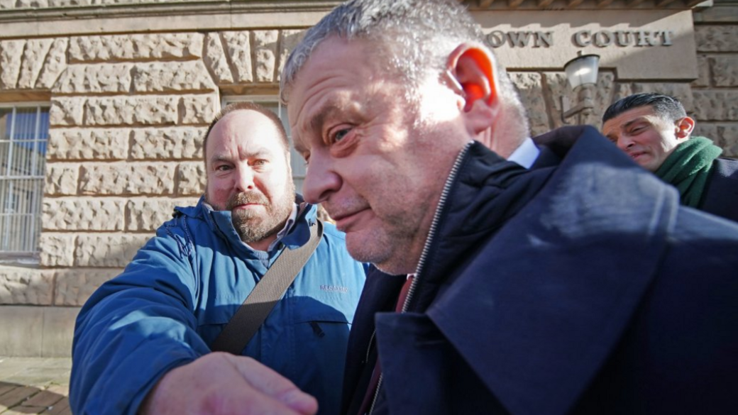 Mike Amesbury outside Chester Magistrates' Court, where he was jailed for 10 weeks in February. The photo shows him walking into court, with journalists in the background