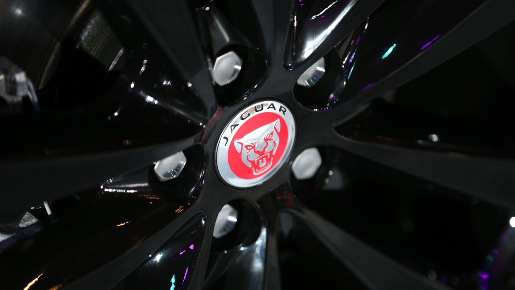 A close-up photo of a wheel of a Jaguar vehicle