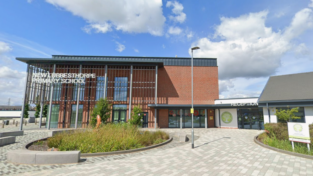 The front of a modern-looking school building