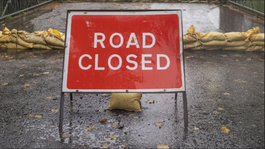 Road closed sign