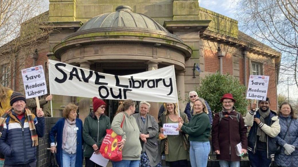 Campaigners outside Meadows Library, Nottingham