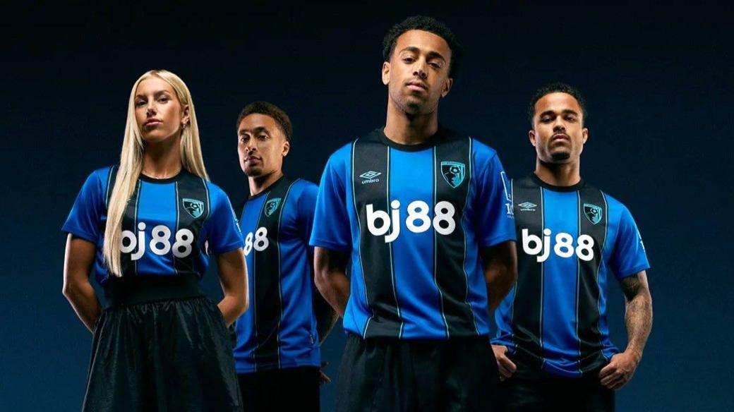 An image of four Bournemouth players wearing the blue and black stripes