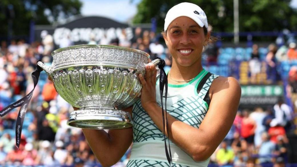 Madison Keys holding trophy at Eastbourne