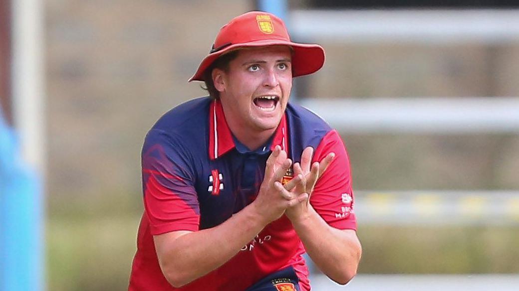 Dan Birrell prepares to take a catch while fielding for Jersey