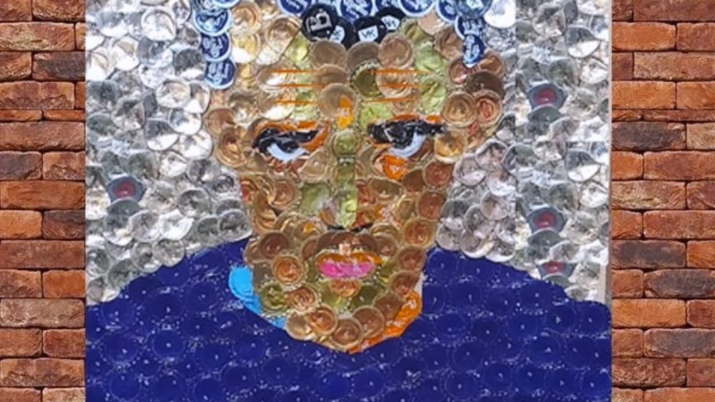 Picture of footballer, Jamie Vardy on a wall, made of bottle tops