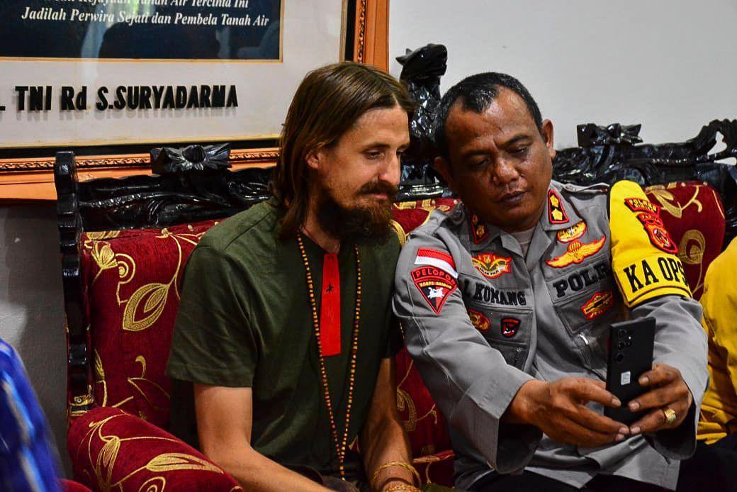 Philip Mehtren smiles for a picture after being freed by Indonesian authorities