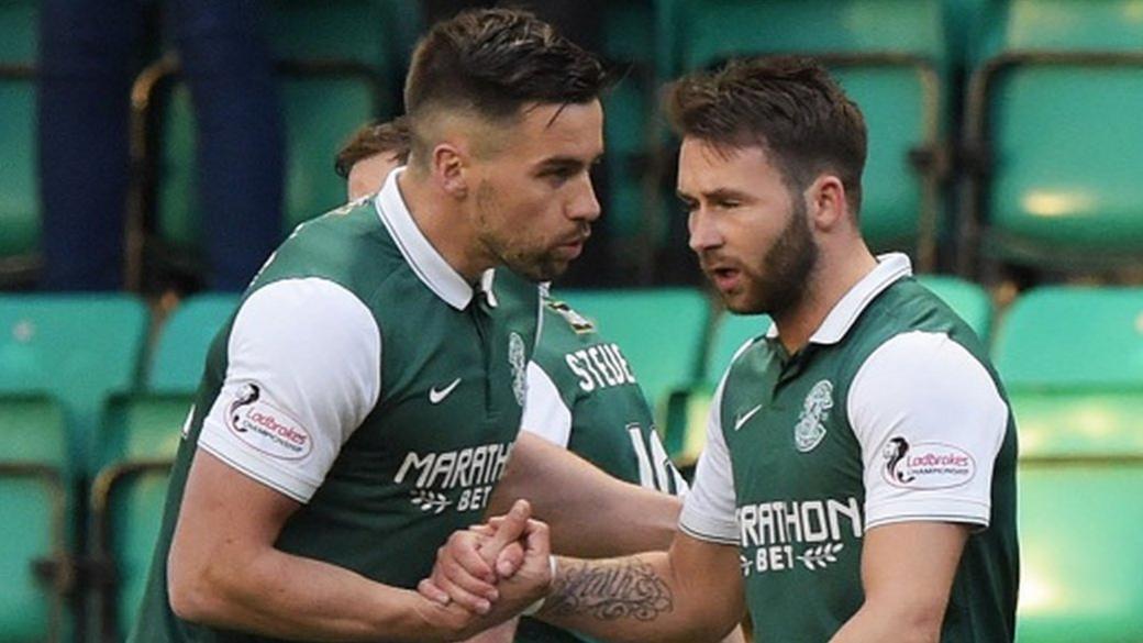 Hibernian's Darren McGregor congratulates James Keatings