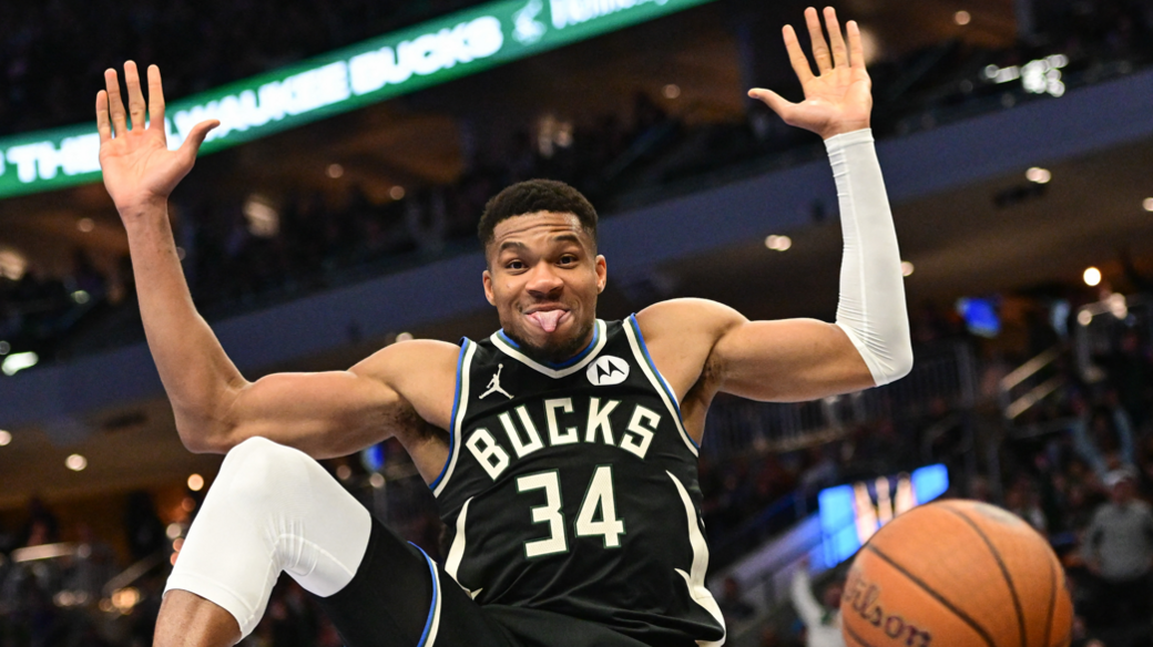 Giannis Antetokounmpo celebrates after scoring a slam dunk for the Milwaukee Bucks against the Indiana Pacers 