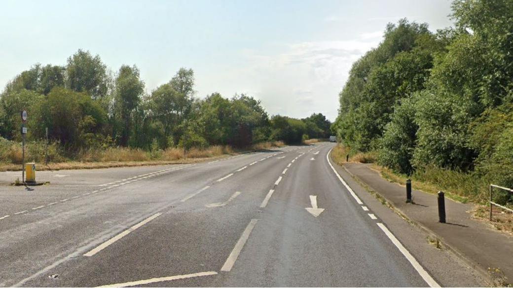 A Google street view look at the A507 near the junction of Ampthill Road. There's a filter lane running down the middle of the road and single lanes running in both directions either side of it.