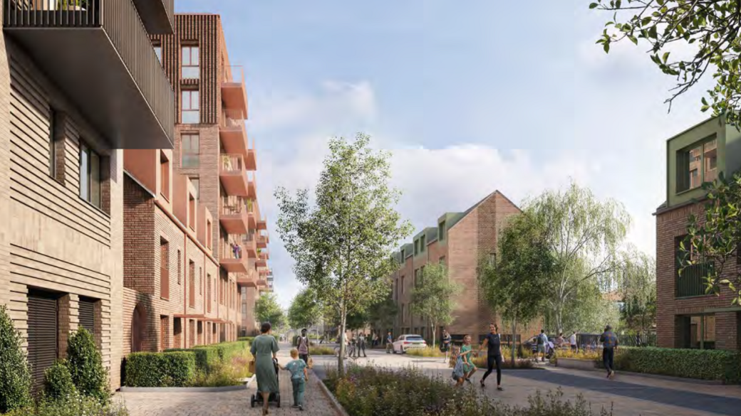 An artistic impression, looking down a street flanked by new-build housing. To the left, a long red brick block of flats is about six storeys high and continues out of view. On the opposite side of the street are shorter red brick terraced townhouses with green-framed dormer windows on the green roofs. Four trees and about 10 people are on the street in various groupings, with the clearest being a woman walking away, pushing a pushchair, with a young boy holding the side.