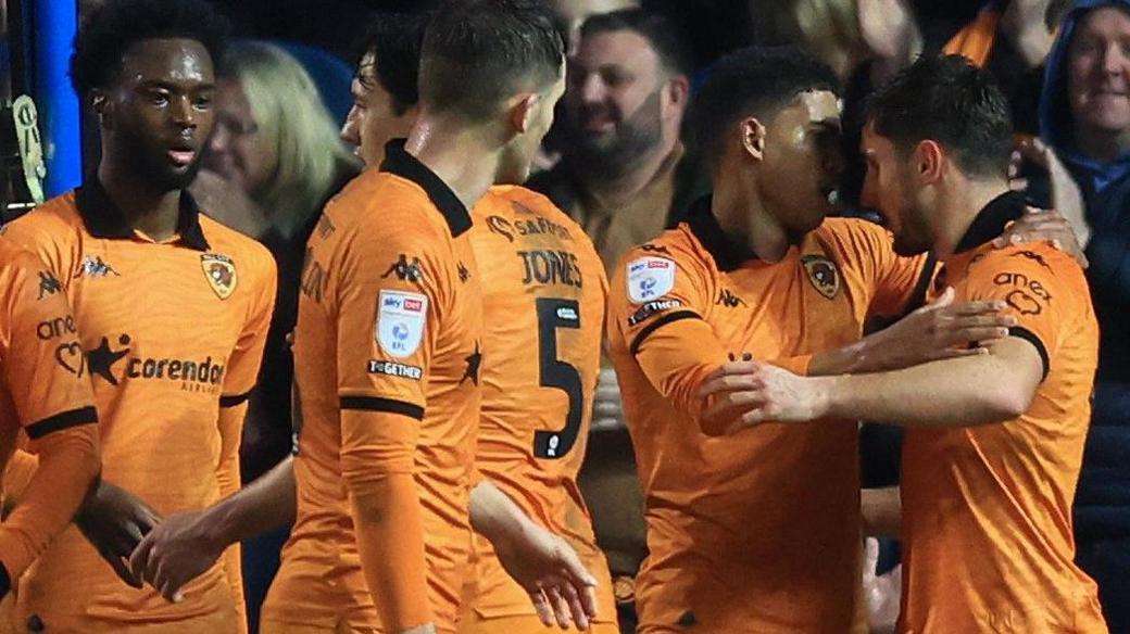 Ryan Longman (right) of Hull City celebrates his goal at Blackburn Rovers with teammates