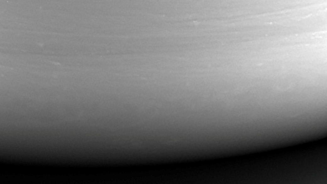 Black and white close-up image of Saturn.