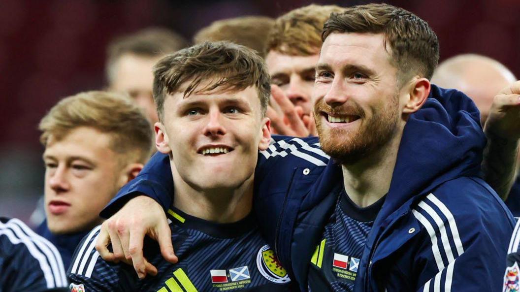 Scotland's Ben Doak and Anthony Ralston at full-time during the UEFA Nations League 2024/25 League A Group A1 match between Poland and Scotland at the PGE Narodowy