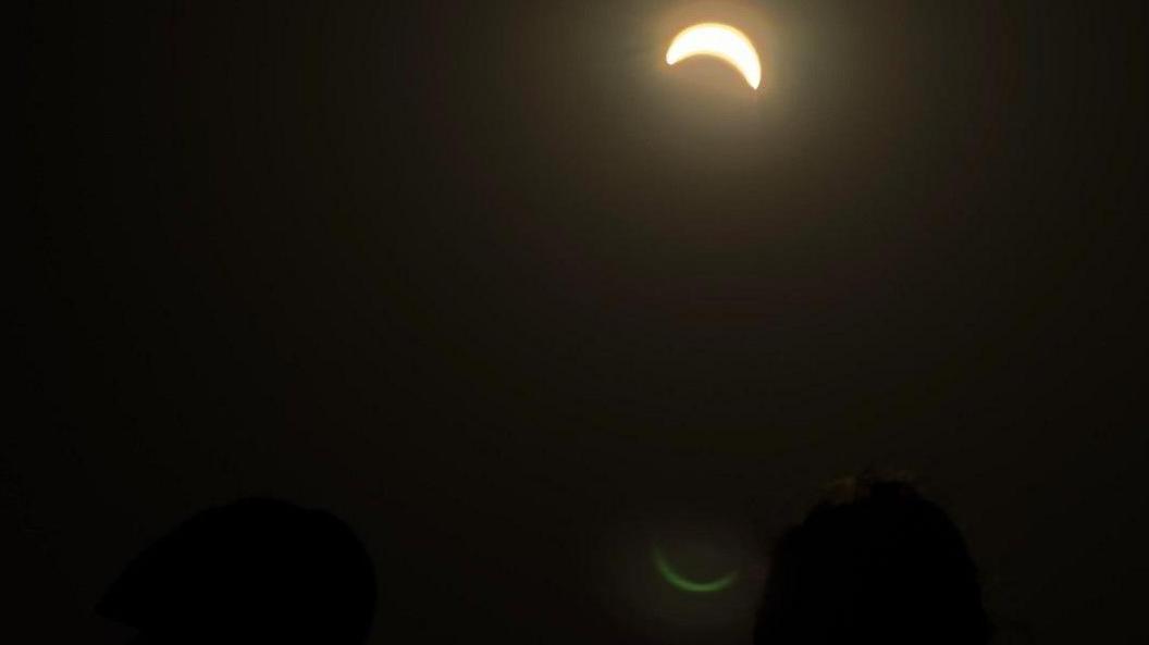 A close up of the partial eclipse viewed in MediaCity