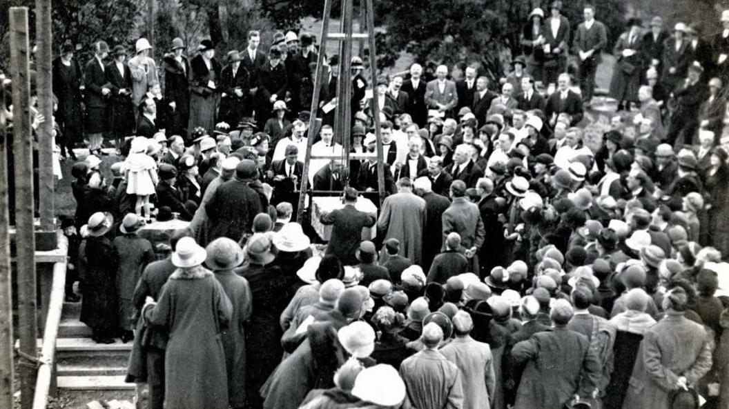 Hundreds of parishioners from between 1925 and 1927 attend a ceremony to raise the corner stone during the demolition of the original church of St Stephen's site.