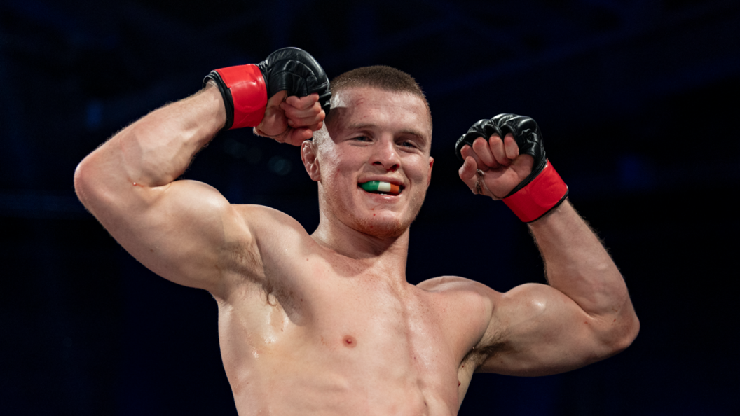 Paul Hughes celebrating after beating Bobby King at the Bellator Champions Series in Dublin in June