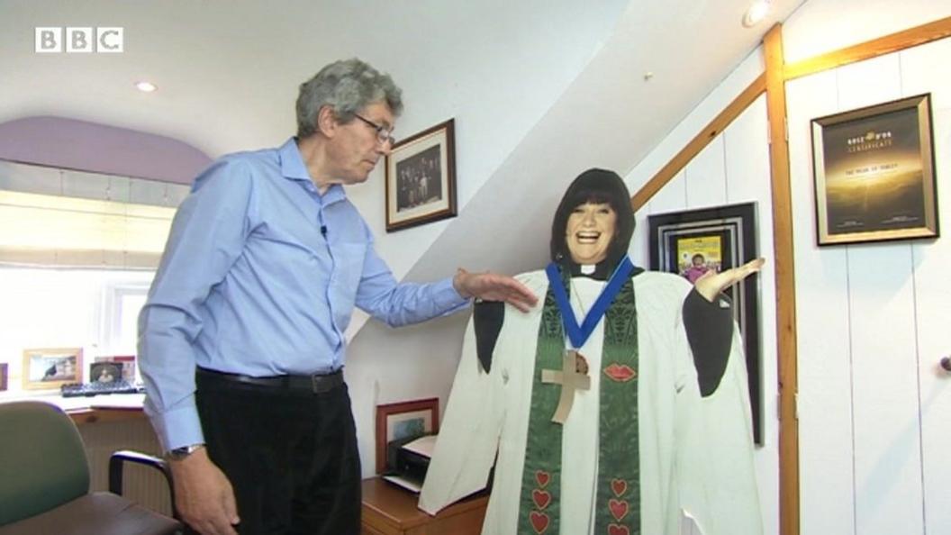 Paul Mayhew-Archer and a cut out of the Vicar of Dibley