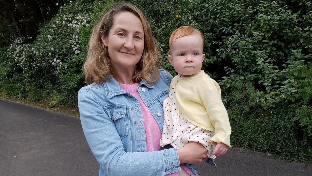 Catherine Gill holding her daughter Brannagh 