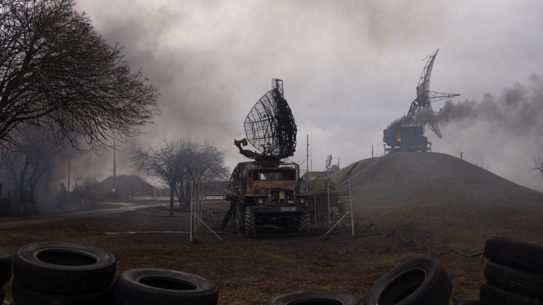 Smoke rises over an air defense base after an apparent Russian strike