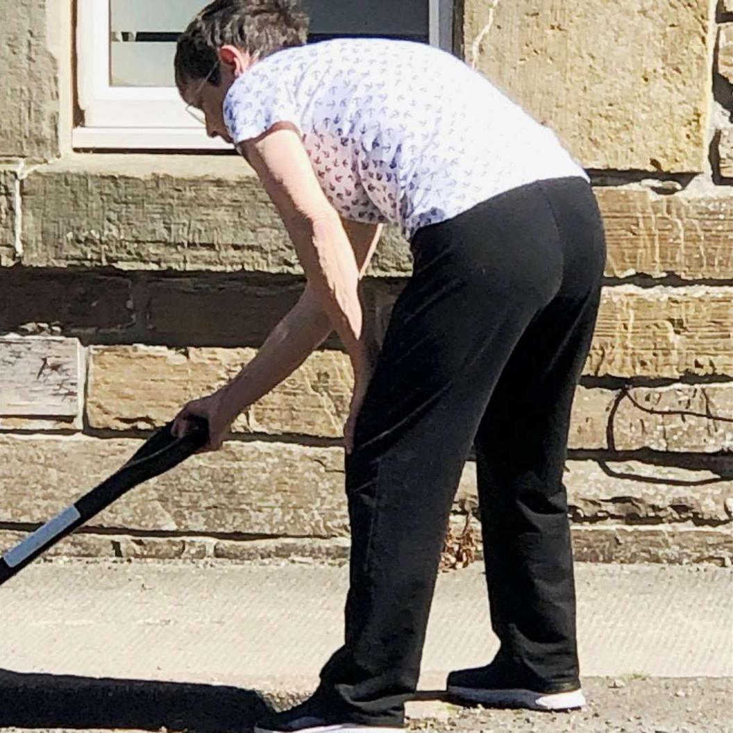 Jenny Paterson at work on the potholes