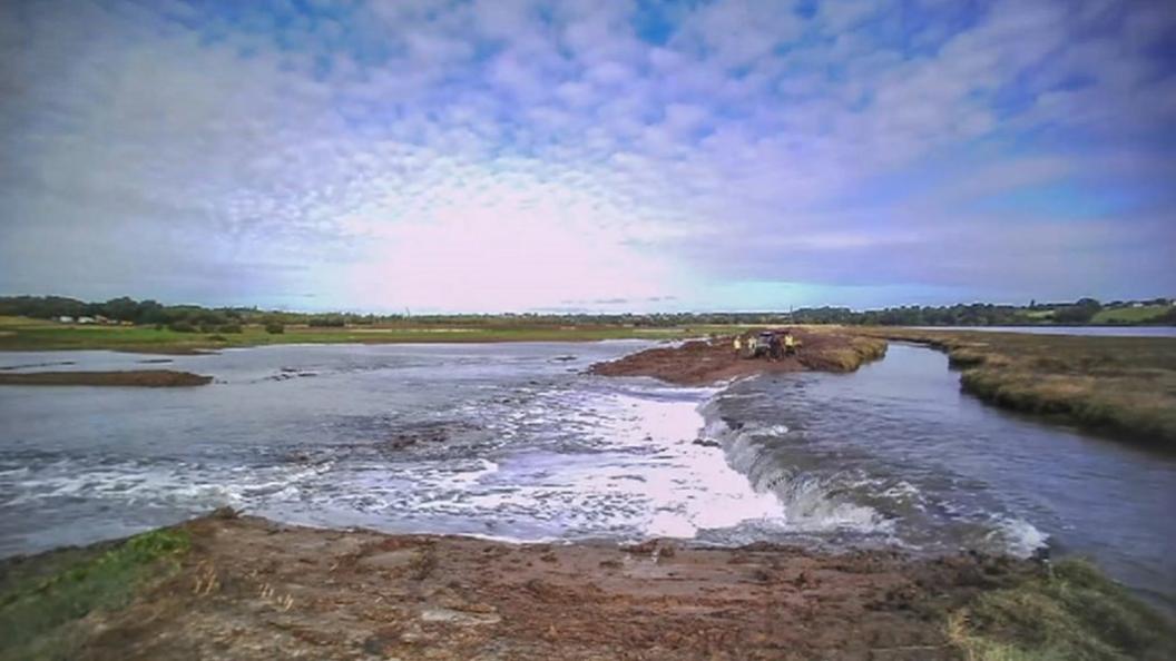 Water floods onto land at Fingringhoe Wick nature reserve