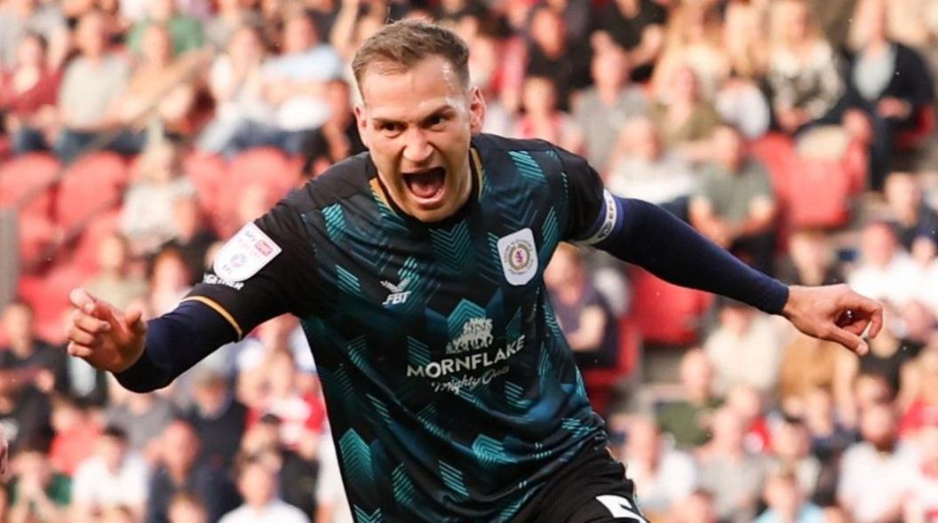 Mickey Demetriou celebrates scoring a crucial goal against Doncaster for Crewe