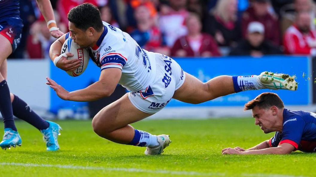Wakefield Trinity's Mason Lino scores a effort against Hull Kingston Rovers