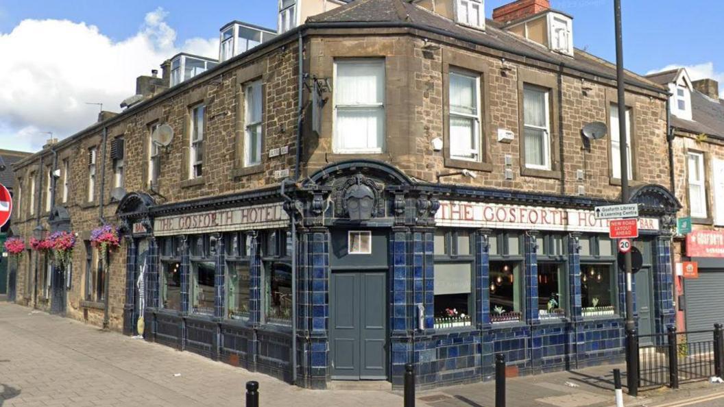 A pub on the corner of a street