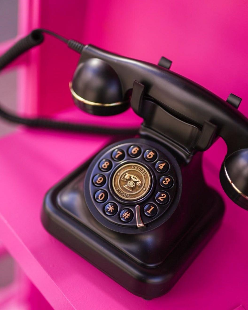 Phone in pink phone booth