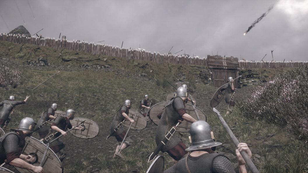 Digitalised Roman soldiers approach a hillfort with spears and shields. Above them is a fenced in hillfort.