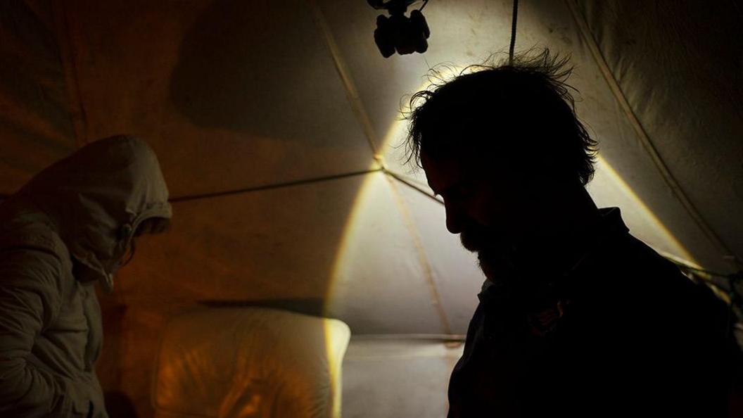 Tony keeping warm in his Arctic bell tent