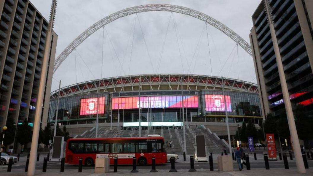 General view of arch at Wembley Stadium which displays "champions" on electronic display board after England won the UEFA Women's Euro 2025 final