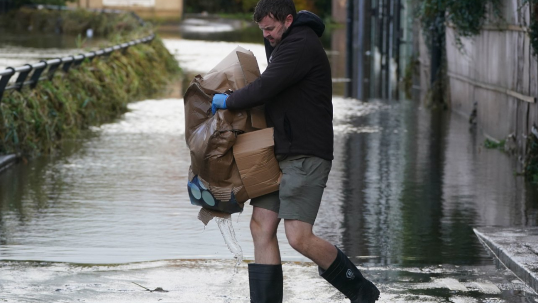 Michael Nugent carrying items