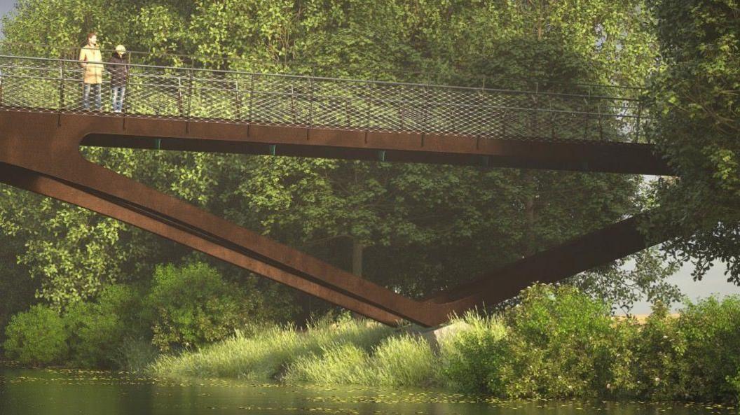 A brown bridge is over the river with two people standing on the bridge. In the background there are green trees and 