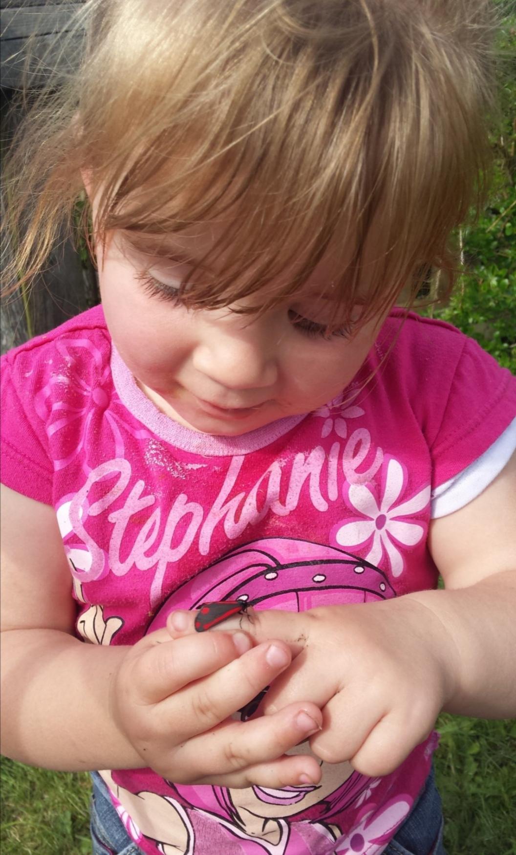 hollie-with-butterfly-on-her-hand