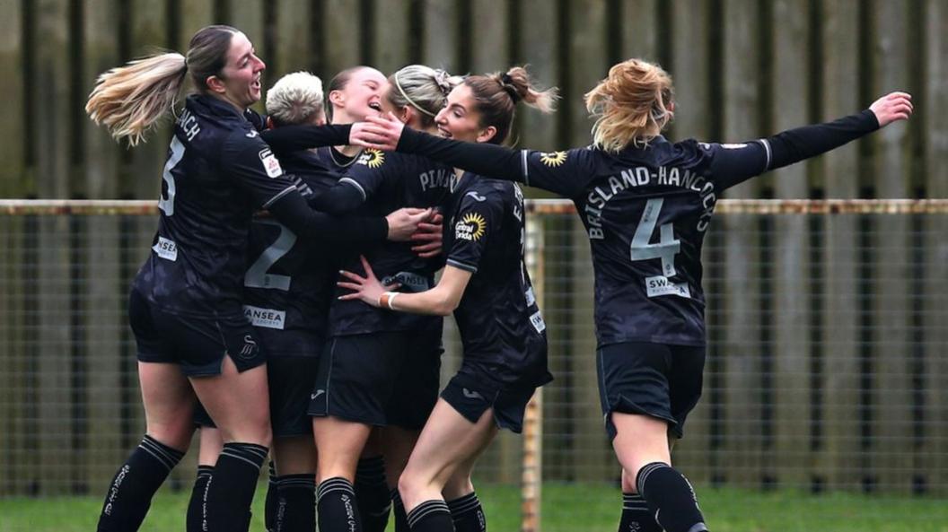 Swansea City players celebrate Aimee Deacon's goal against Wrexham