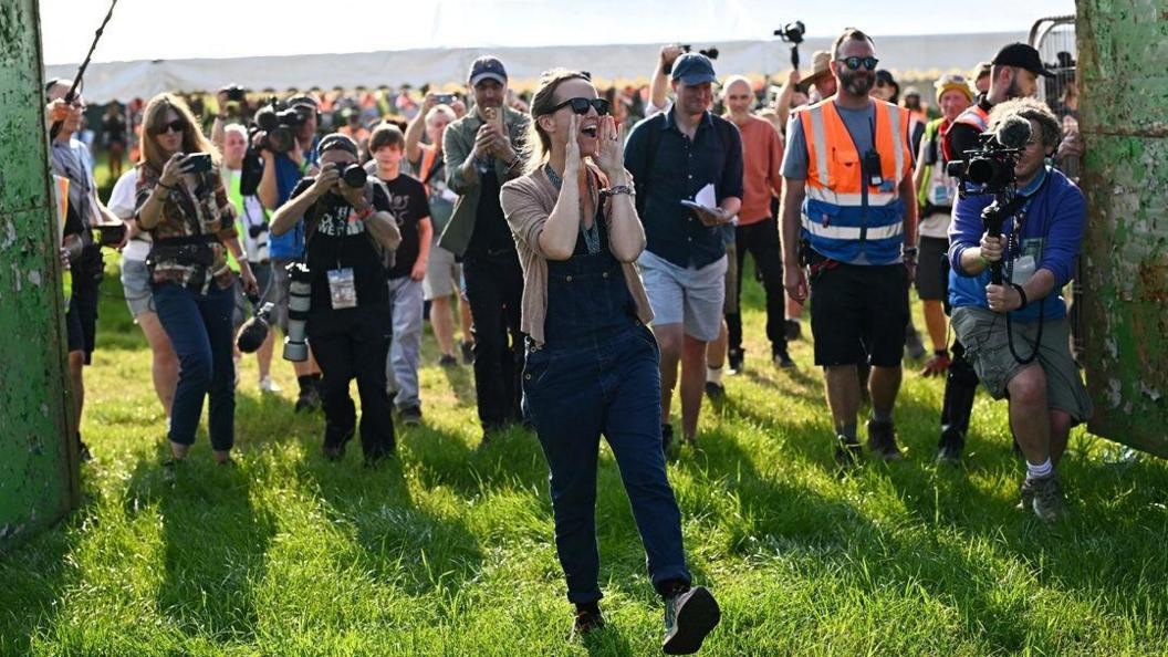 Emily Eavis, organiser of the annual Glastonbury Festival, officially opens the gates at Worthy Farm for the Glastonbury Festival, in Pilton, Somerset, Britain, June 26, 2024