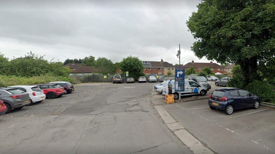 A generic car park full of vehicles 