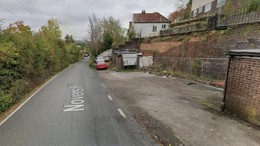 A Google image view of a residential road and empty lay-by.